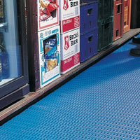 Floorline helps to absorb spillages and protect delicate glassware in this busy bar.