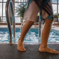 Heronrib creates a slip-resistant walkway in this busy swimming pool.