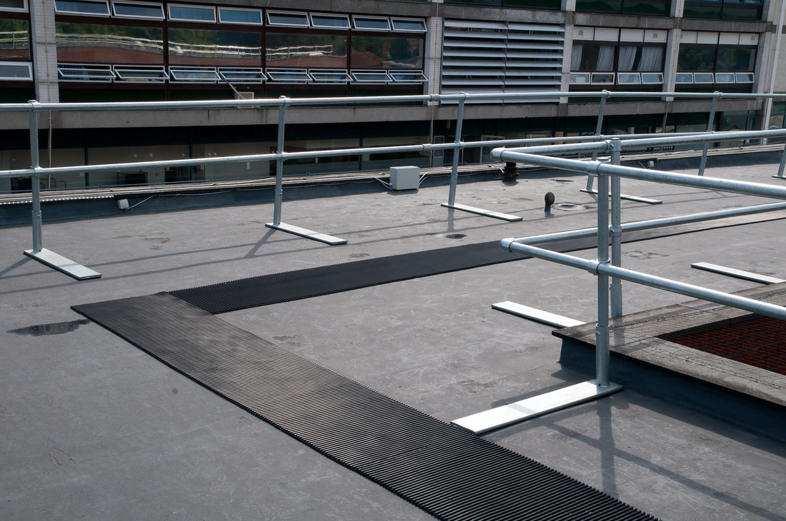 Crossgrip PVC loose laid on a high level walkway. 
