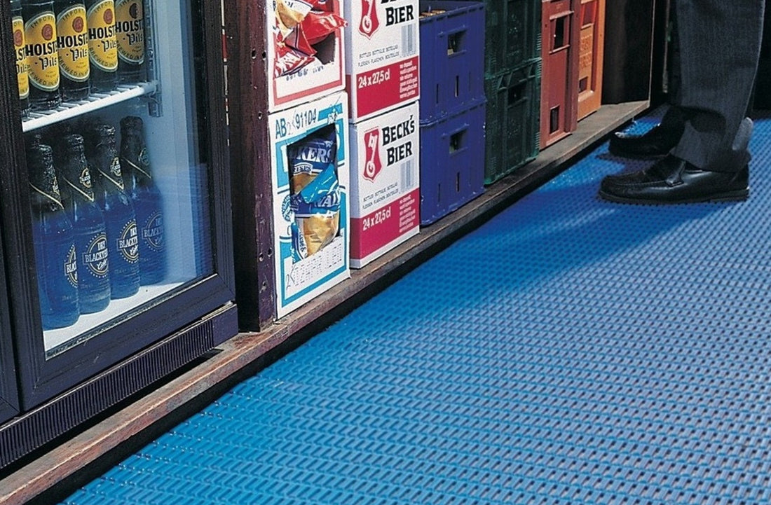 Floorline helps to absorb spillages and protect delicate glassware in this busy bar. 